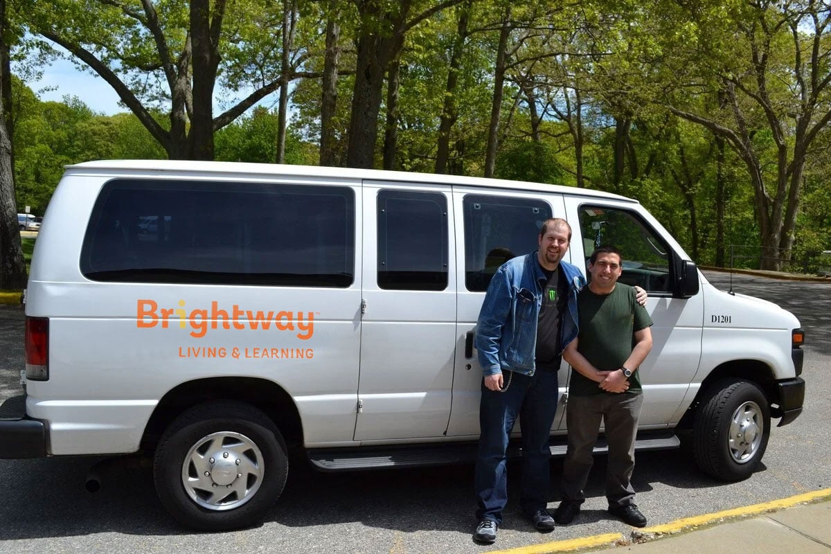 ddi-employees-standing-in-front-of-brightway-van-v2