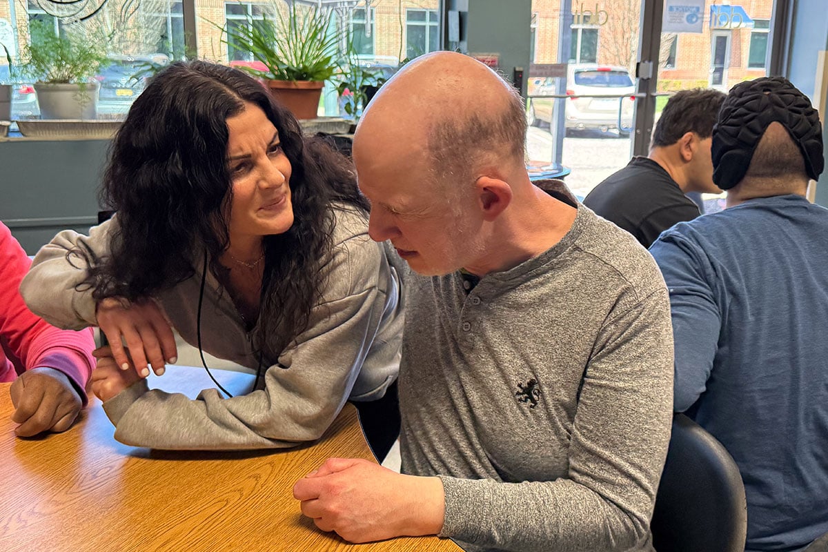 instructor-connecting-with-student-in-classroom